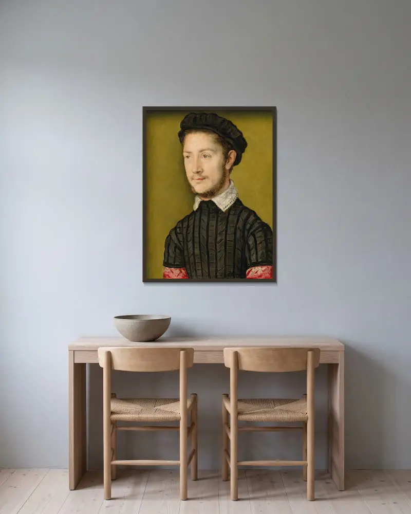 Portrait Of A Young Man, Probably An Officer Royal av Corneille de Lyon inramad på en vägg