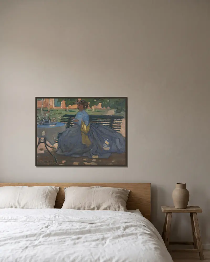 Frau an einem Gartentisch von Bernard Boutet de Monvel gerahmt an einer Wand