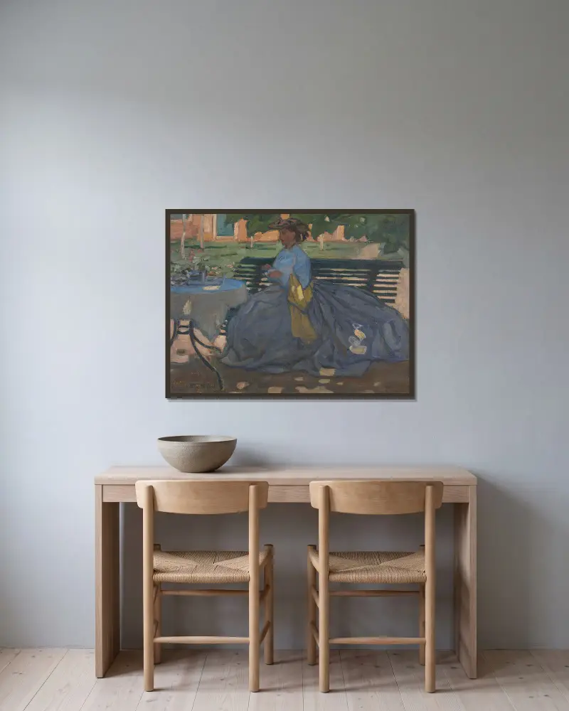 Frau an einem Gartentisch von Bernard Boutet de Monvel gerahmt an einer Wand