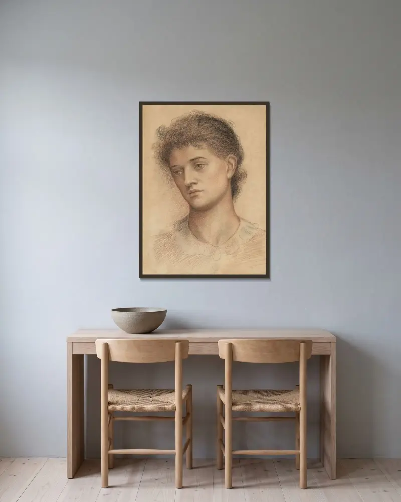 Porträtt av ett kvinnohuvud av Evelyn De Morgan inramad på en vägg