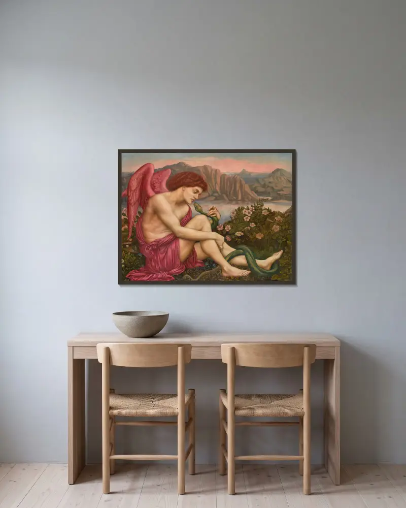 Der Engel mit der Schlange von Evelyn De Morgan gerahmt an einer Wand