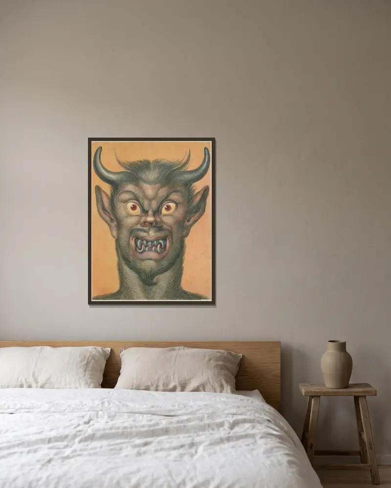 Head of a grimacing devil with horns av David Humbert de Superville inramad på en vägg