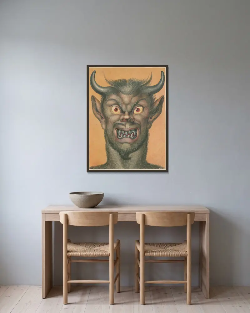 Head of a grimacing devil with horns av David Humbert de Superville inramad på en vägg