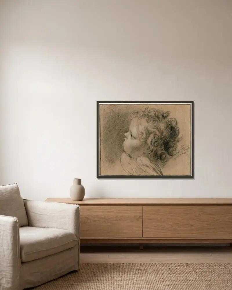 Engelenkopje (cherub) av Jacob de Wit inramad på en vägg