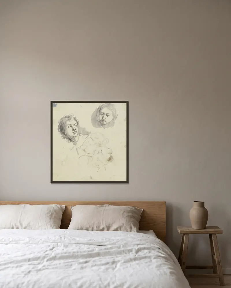 Zwei Köpfe von Jacob de Wit gerahmt an einer Wand