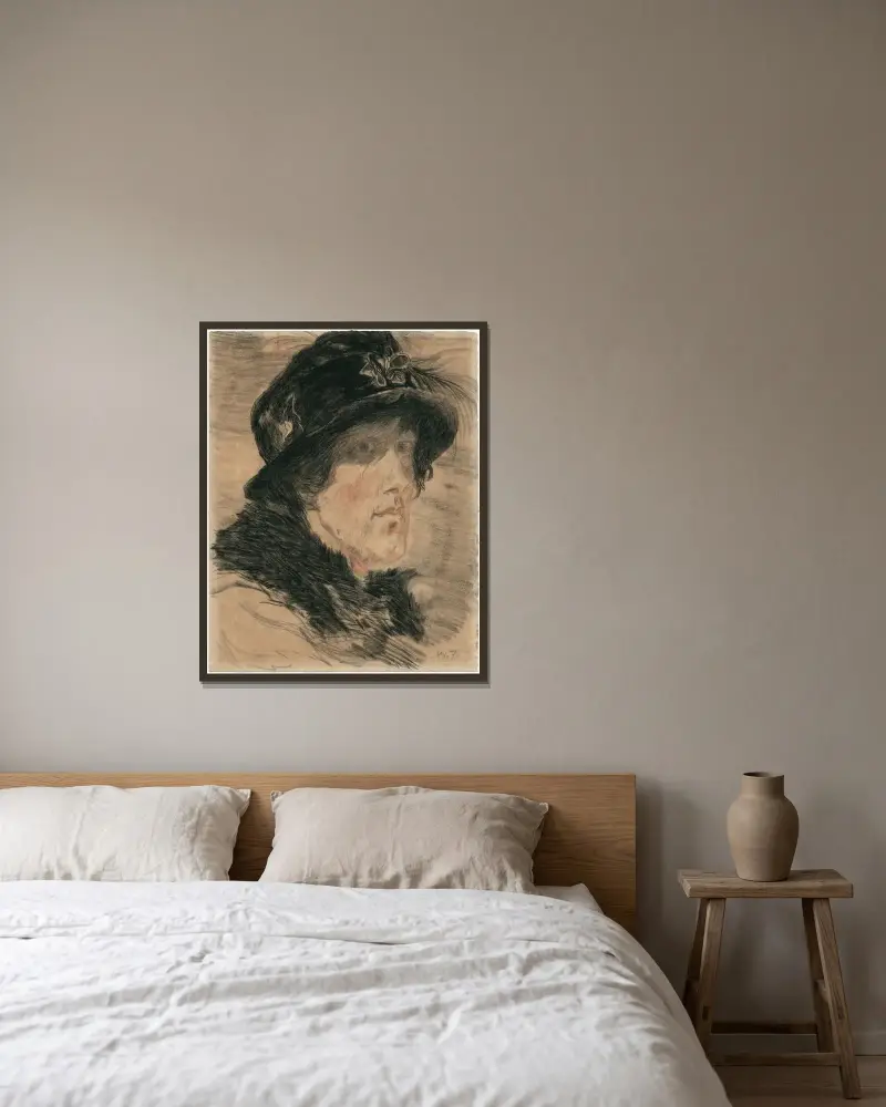 Kvinnohuvud med hatt och päls av Willem de Zwart inramad på en vägg