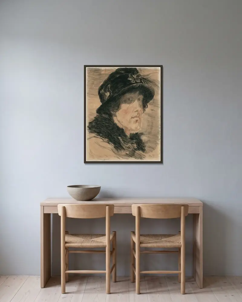 Kvinnohuvud med hatt och päls av Willem de Zwart inramad på en vägg