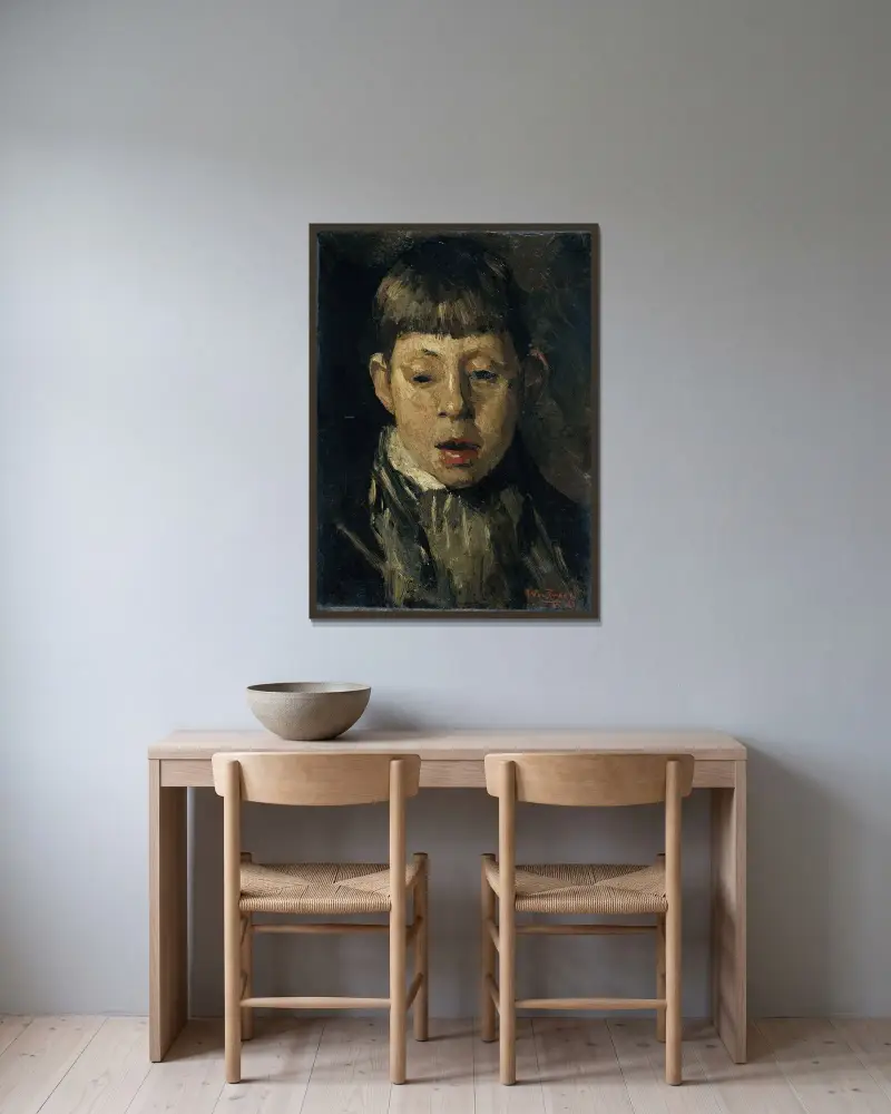 Jongenskop av Willem de Zwart inramad på en vägg