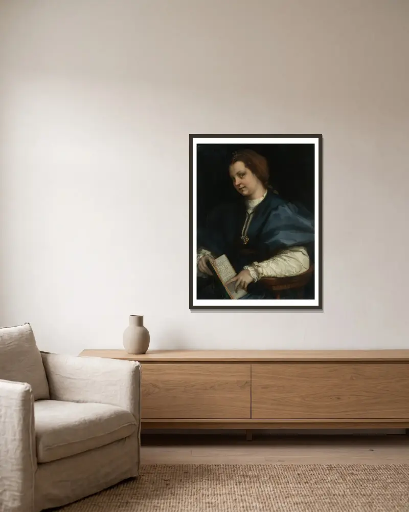 Lady with a book of Petrarch’s rhyme av Andrea del Sarto inramad på en vägg