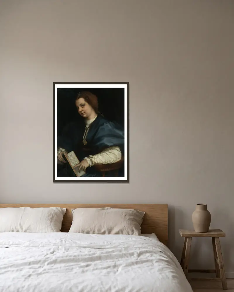 Lady with a book of Petrarch’s rhyme av Andrea del Sarto inramad på en vägg