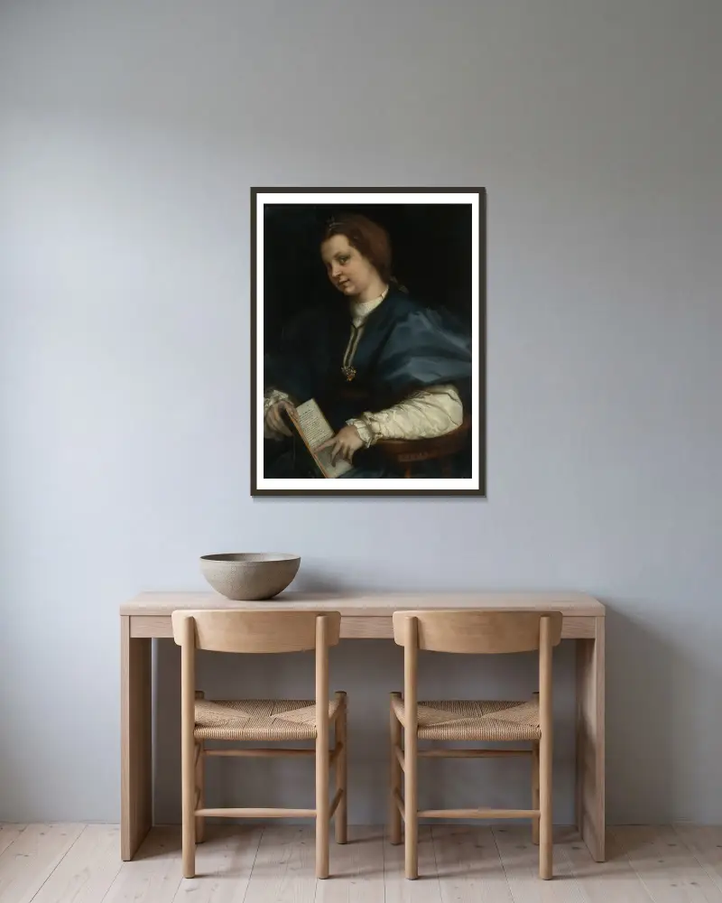 Lady with a book of Petrarch’s rhyme av Andrea del Sarto inramad på en vägg