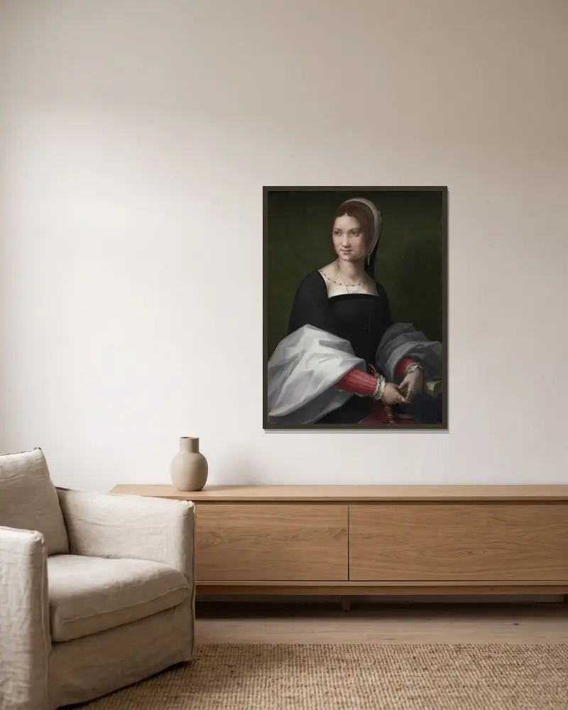 Portrait of a Woman av Andrea del Sarto inramad på en vägg