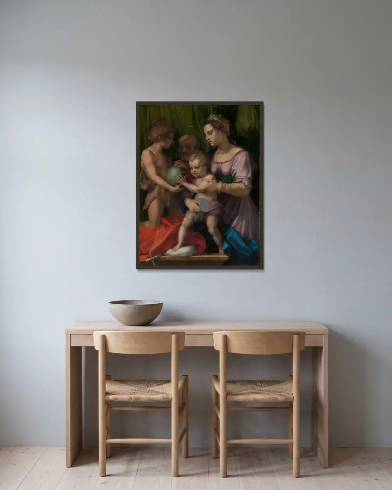 The Holy Family with the Young Saint John the Baptist av Andrea del Sarto inramad på en vägg