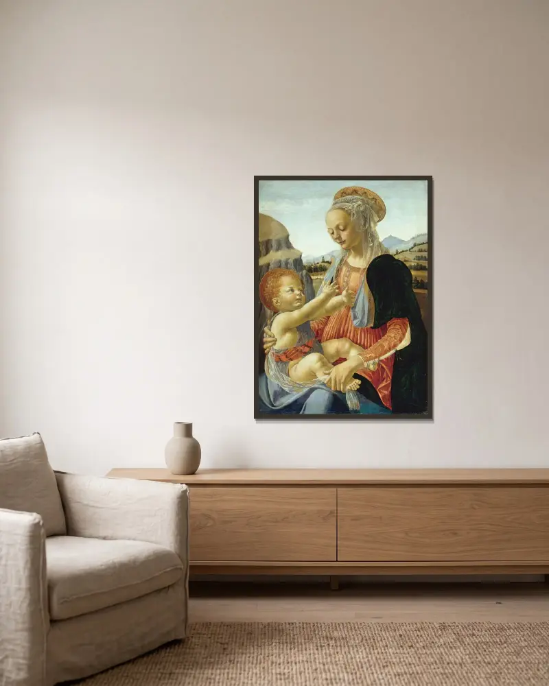 Jungfrun med det sittande barnet av Andrea del Verrocchio inramad på en vägg