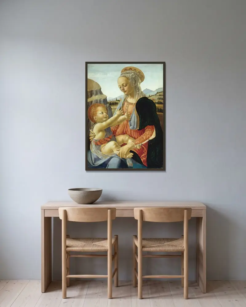 Jungfrun med det sittande barnet av Andrea del Verrocchio inramad på en vägg