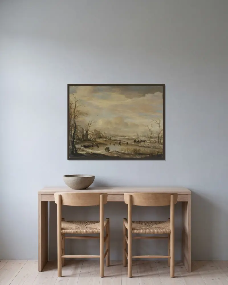 Frusen flod med gångbro av Aert van der Neer inramad på en vägg