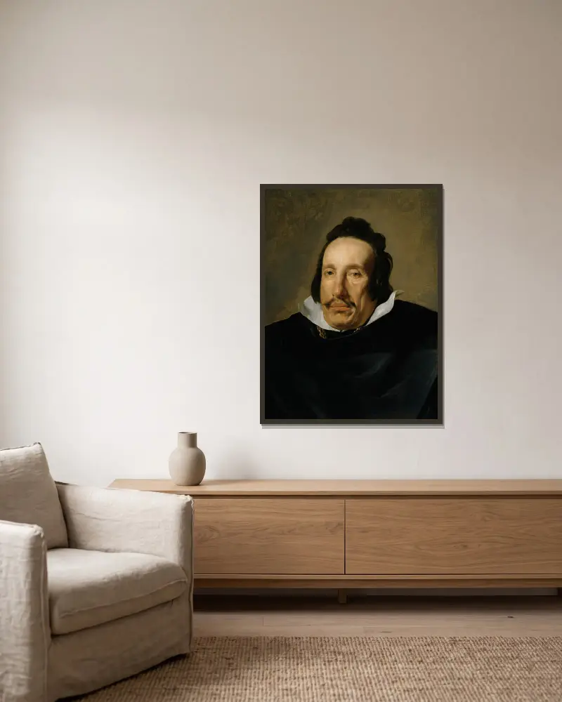 Portrait of a Man av Diego Velázquez inramad på en vägg