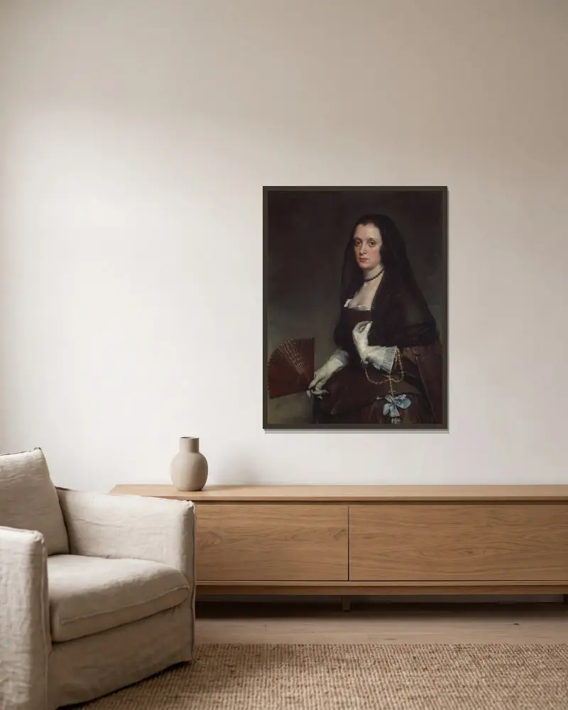 The Lady with a Fan av Diego Velázquez inramad på en vägg