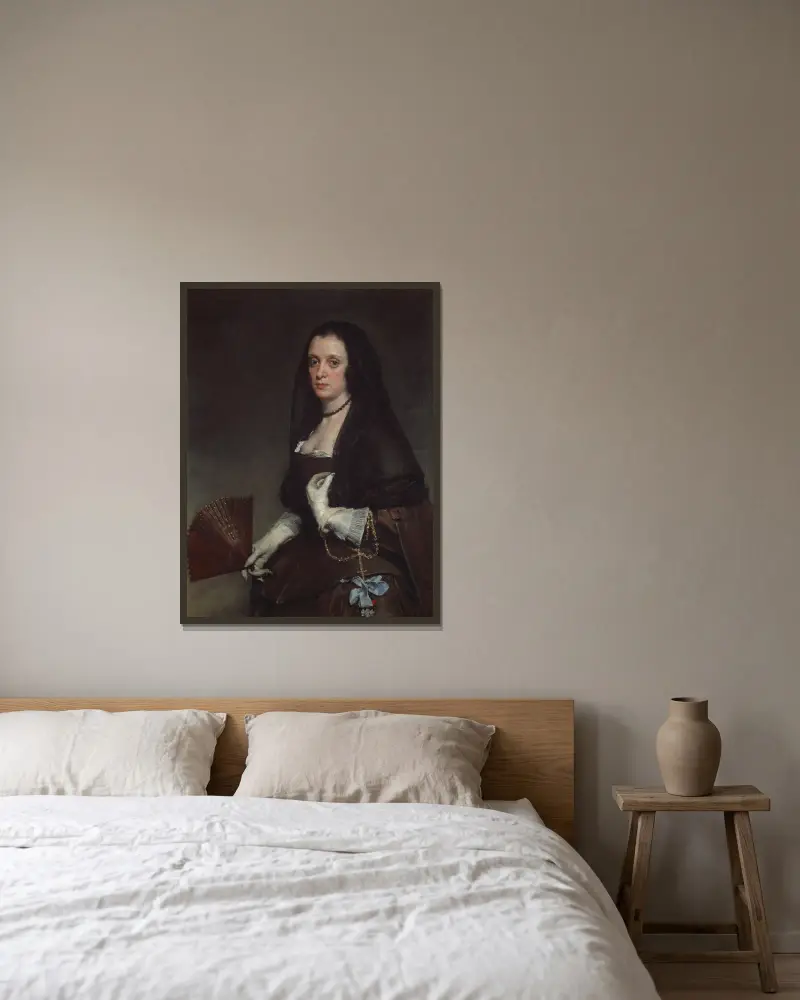 The Lady with a Fan av Diego Velázquez inramad på en vägg