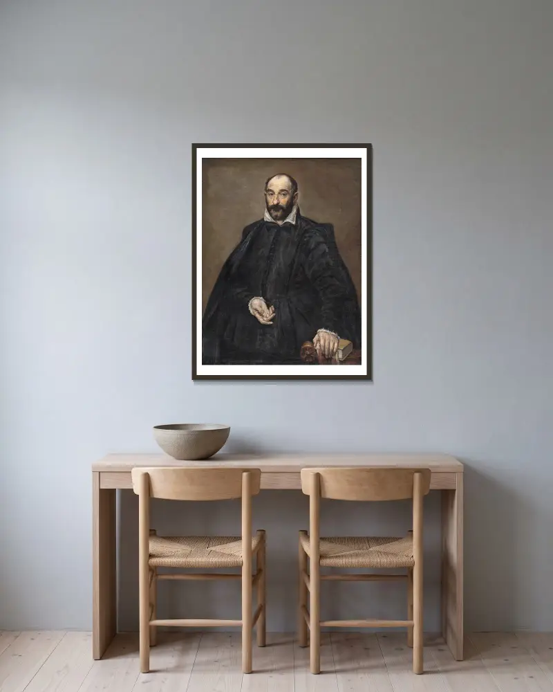 Portrait of a Man av El Greco (Domenikos Theotokopoulos) inramad på en vägg