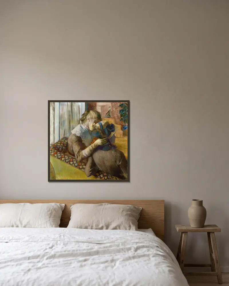 Bei der Modistin, 1881 von Edgar Degas gerahmt an einer Wand