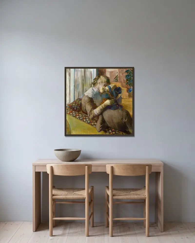 Bei der Modistin, 1881 von Edgar Degas gerahmt an einer Wand