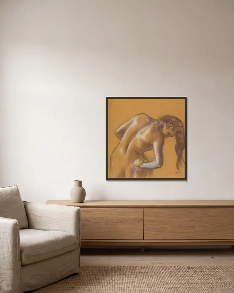 Badende Frau, sich abtrocknend von Edgar Degas gerahmt an einer Wand