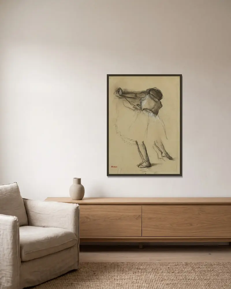 Tänzerin von hinten gesehen von Edgar Degas gerahmt an einer Wand