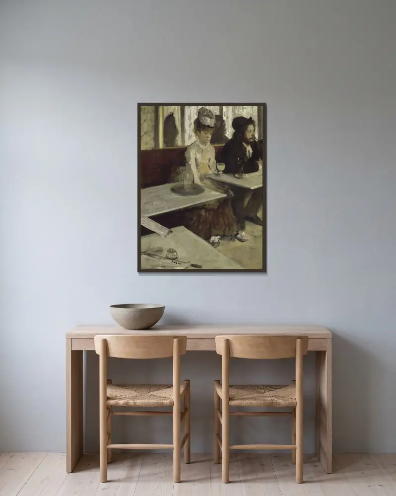 V kavárně, Edgar Degas v rámu na stěně
