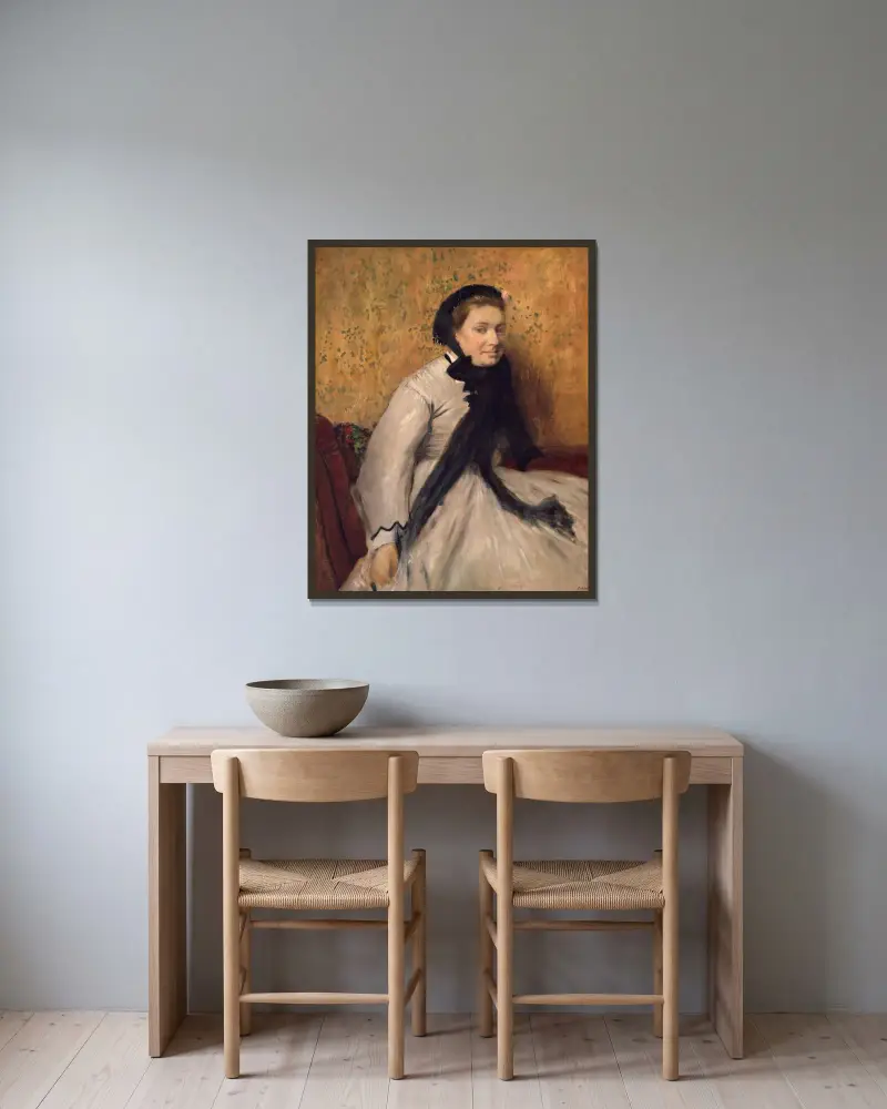 Bildnis einer Frau in Grau von Edgar Degas gerahmt an einer Wand