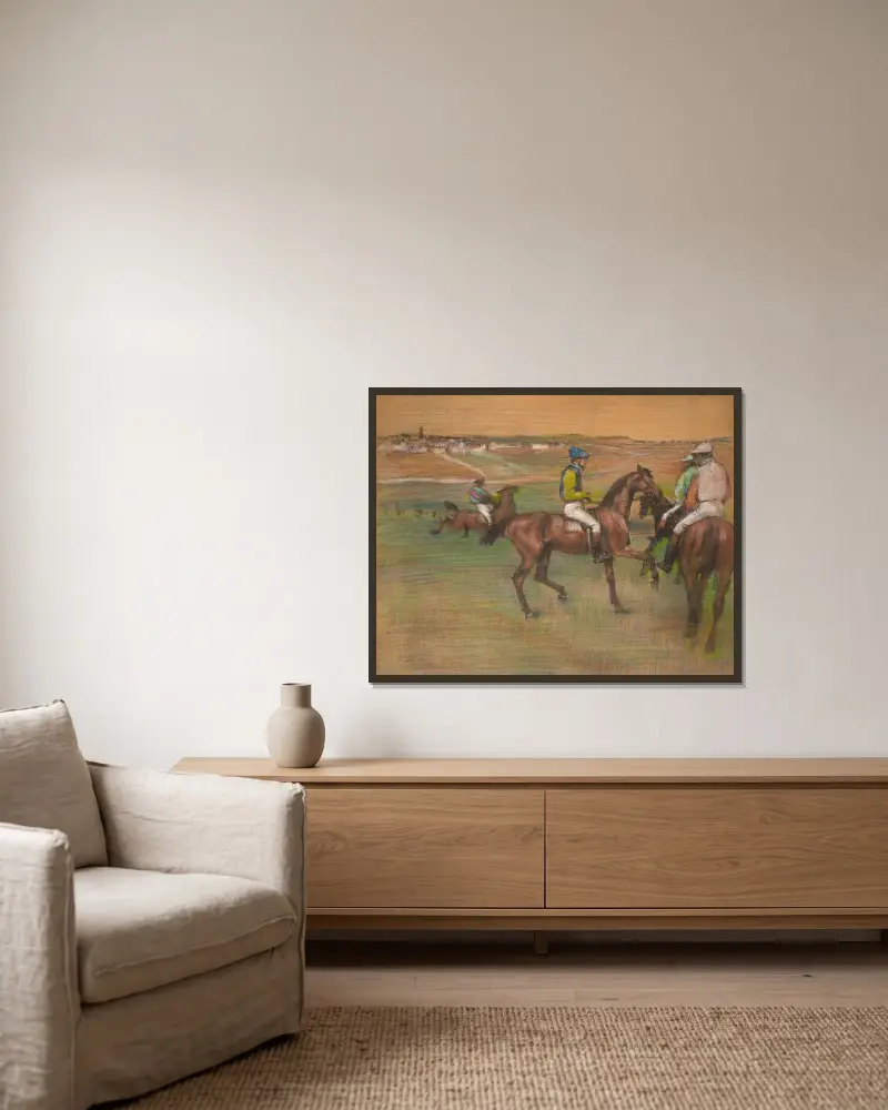 Pferderennen von Edgar Degas gerahmt an einer Wand