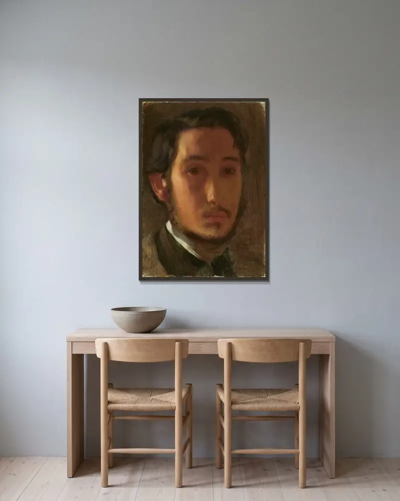 Selbstbildnis mit weißem Kragen von Edgar Degas gerahmt an einer Wand