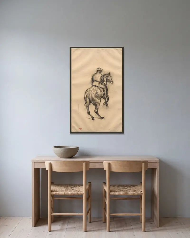 Der Jockey von Edgar Degas gerahmt an einer Wand