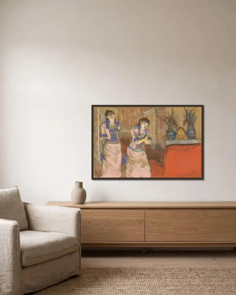 Zwei Frauen von Edgar Degas gerahmt an einer Wand
