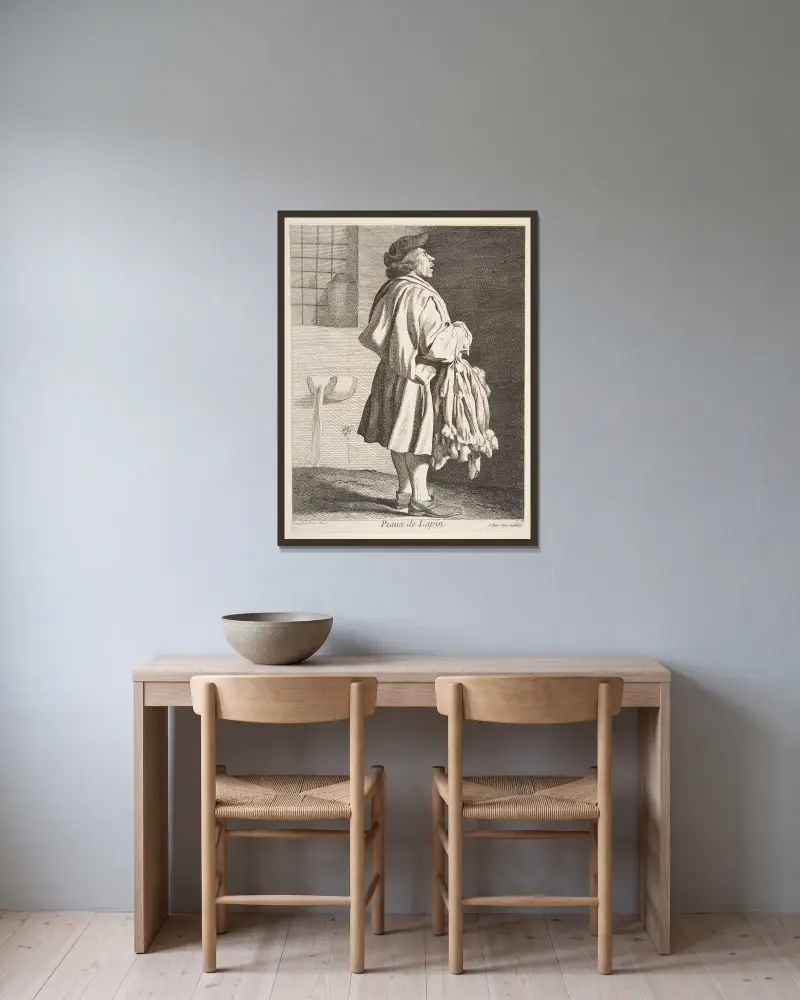 Kaninfellhändler von Edmé Bouchardon gerahmt an einer Wand