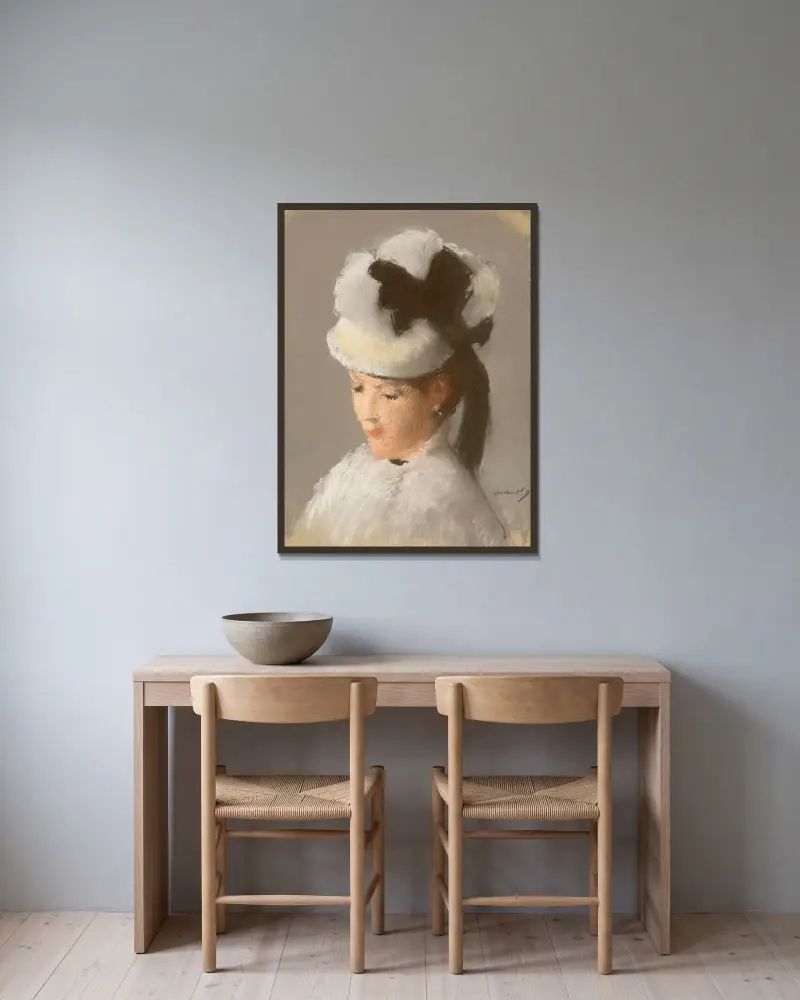 Jeune femme au chapeau blanc av Édouard Manet inramad på en vägg