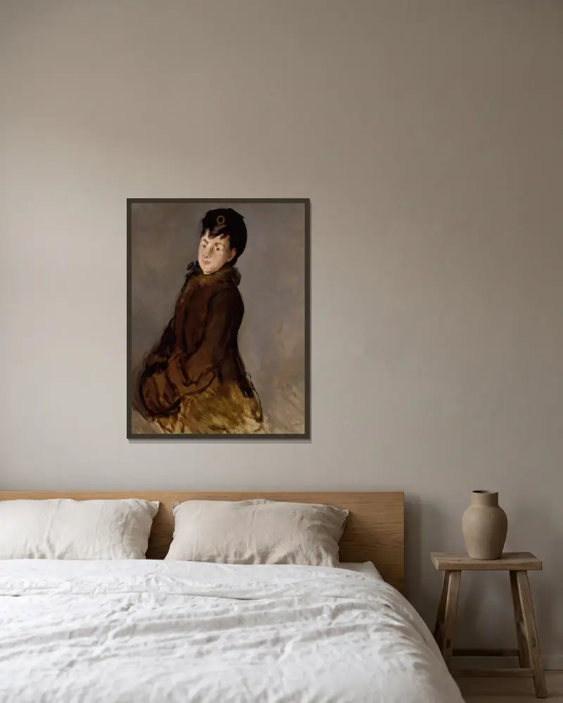 Portrait of Isabelle Lemonnier with a Muff av Édouard Manet inramad på en vägg