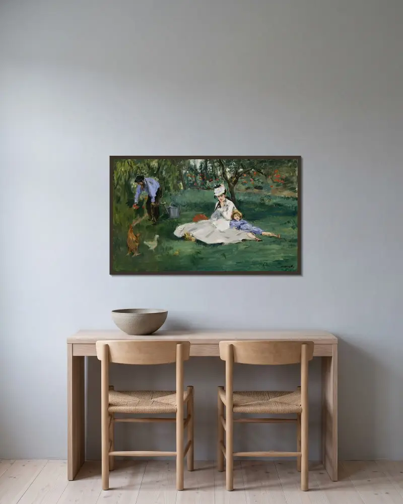 Die Familie Monet im Garten in Argenteuil von Édouard Manet gerahmt an einer Wand