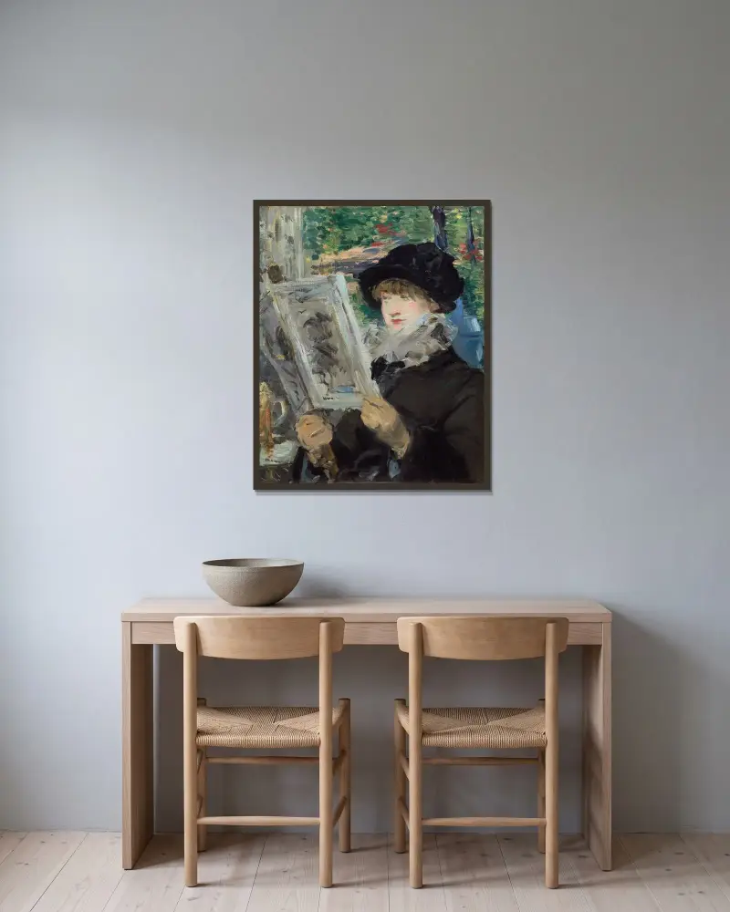 Lesende Frau von Édouard Manet gerahmt an einer Wand