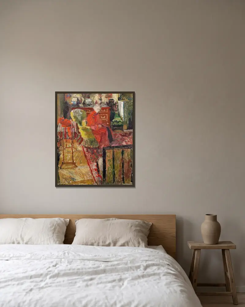 Madame Vuillard en peignoir rouge av Édouard Vuillard inramad på en vägg