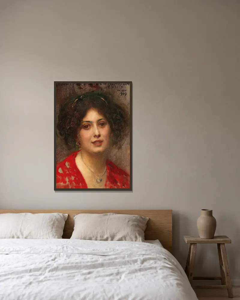 Porträtt av en ung kvinna i röd klänning av Eduard Veith inramad på en vägg