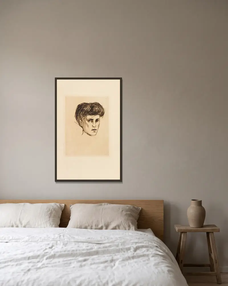Frauenkopf von Edvard Munch gerahmt an einer Wand