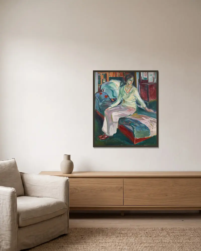 Sedící modelka na pohovce, Edvard Munch v rámu na stěně
