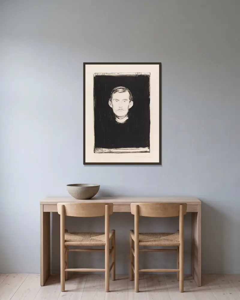 Selbstbildnis von Edvard Munch gerahmt an einer Wand