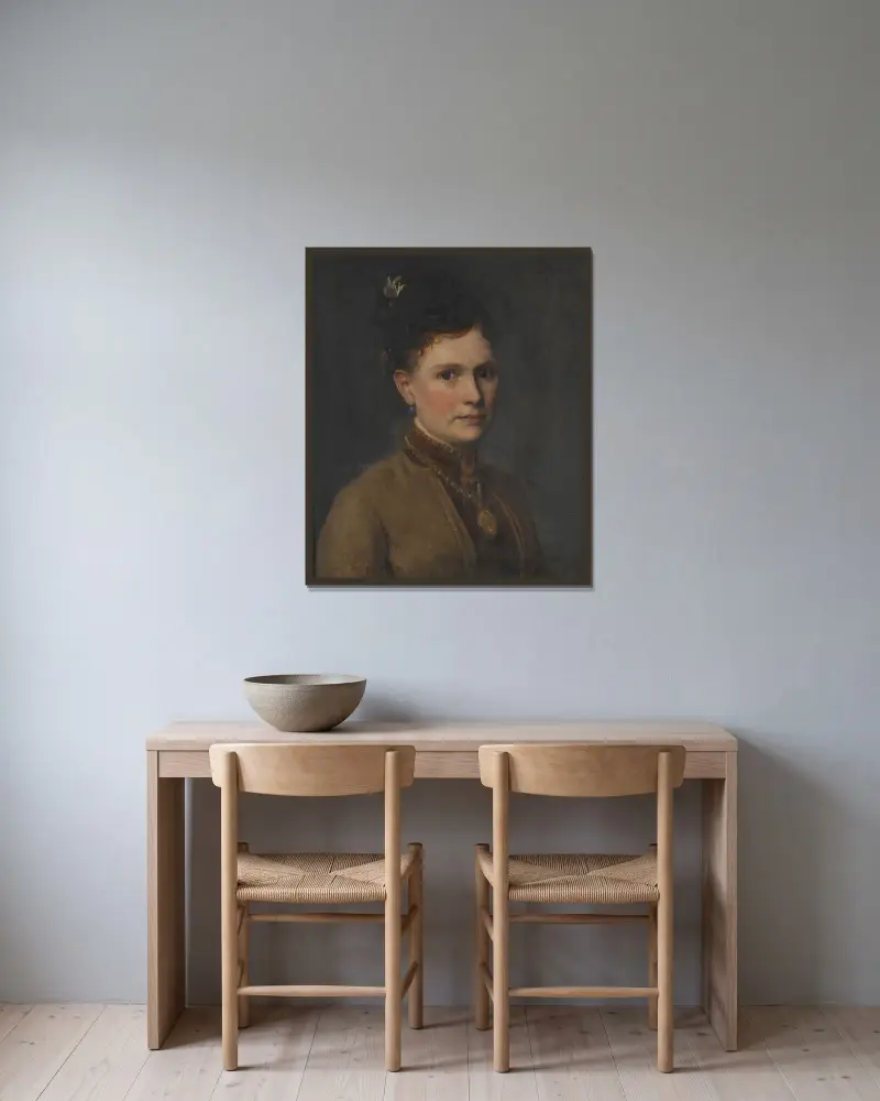 Maria Agnes Claesson (1843- efter 1903) av Edvard Perséus inramad på en vägg