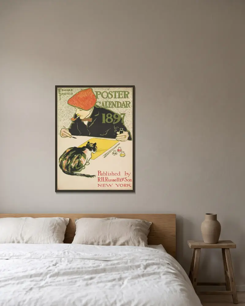 Omslag för 1897 års kalender av Edward Penfield inramad på en vägg