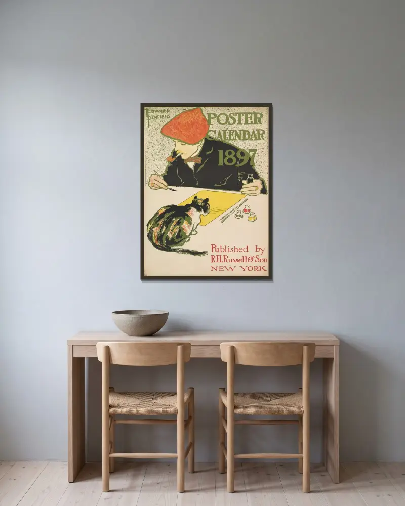 Omslag för 1897 års kalender av Edward Penfield inramad på en vägg
