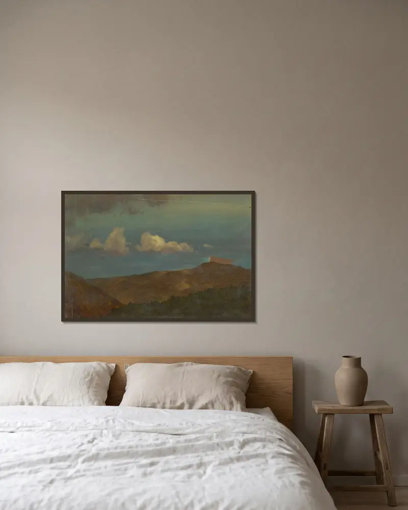 Kuperat landskap av Frederic Edwin Church inramad på en vägg