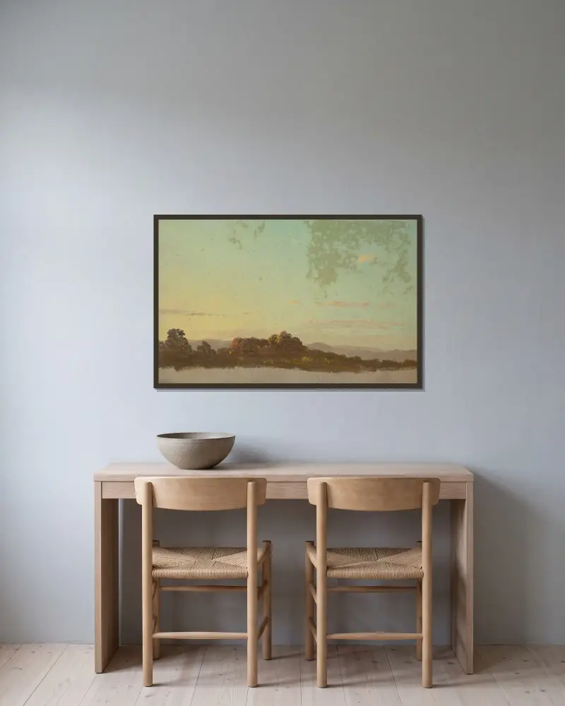 Sommarlandskap av Frederic Edwin Church inramad på en vägg