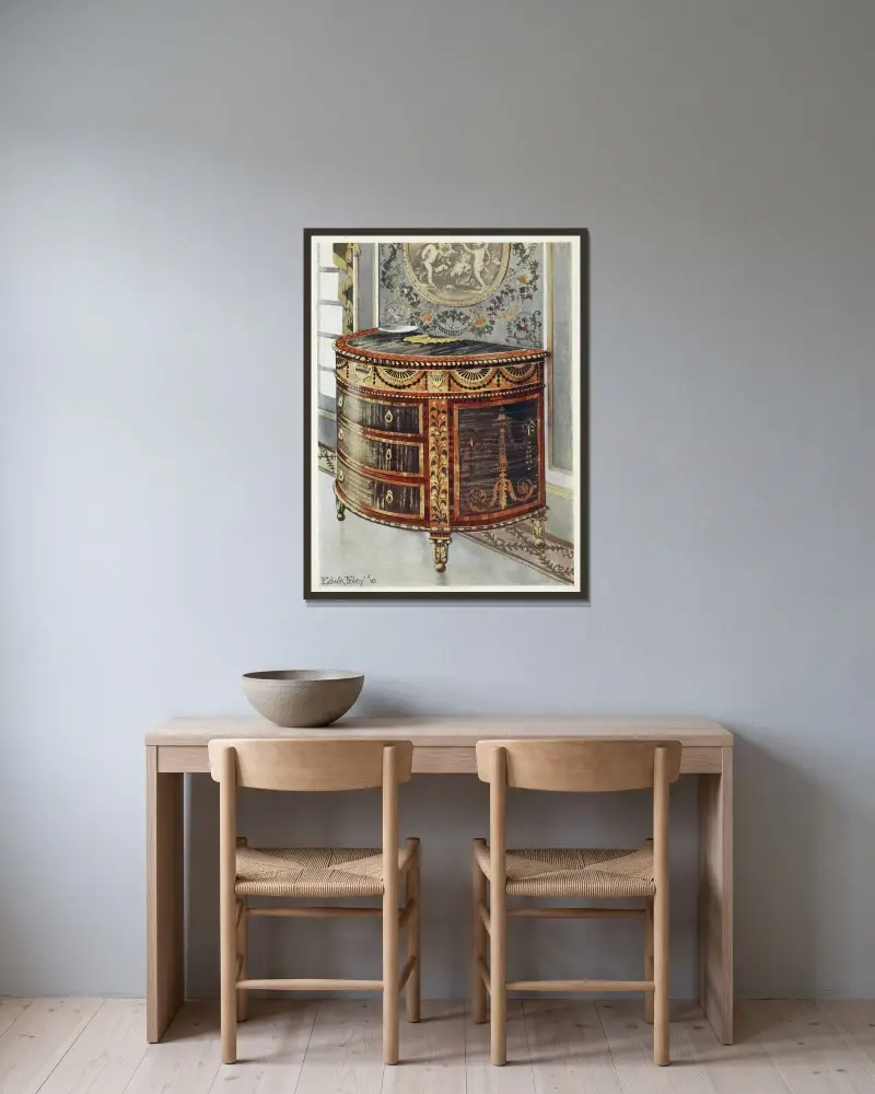 Inlaid satinwood commode av Edwin Foley inramad på en vägg